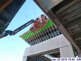 Installing wood block along the parapet Facing East.jpg